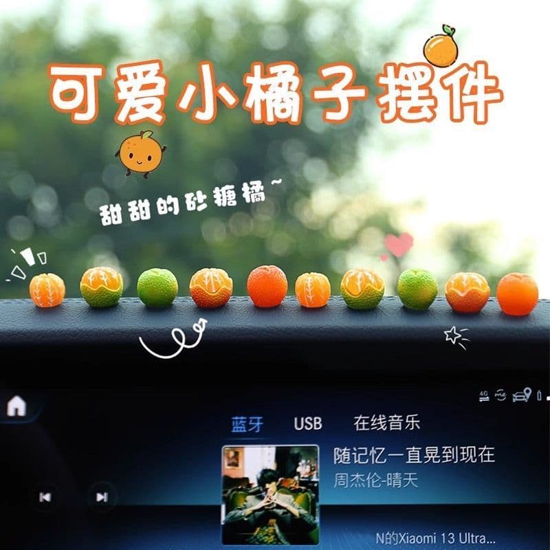 Miniature decorative orange ornament for car dashboard, home, and desk