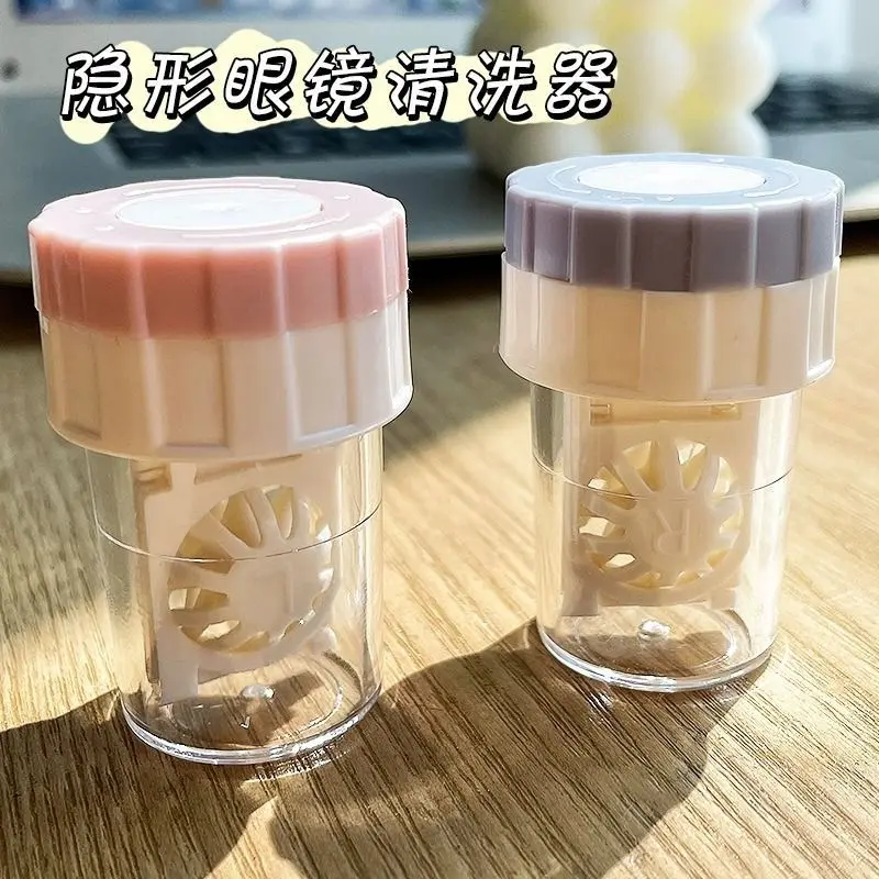 Contact lens cleaner with rotating case and desktop storage box