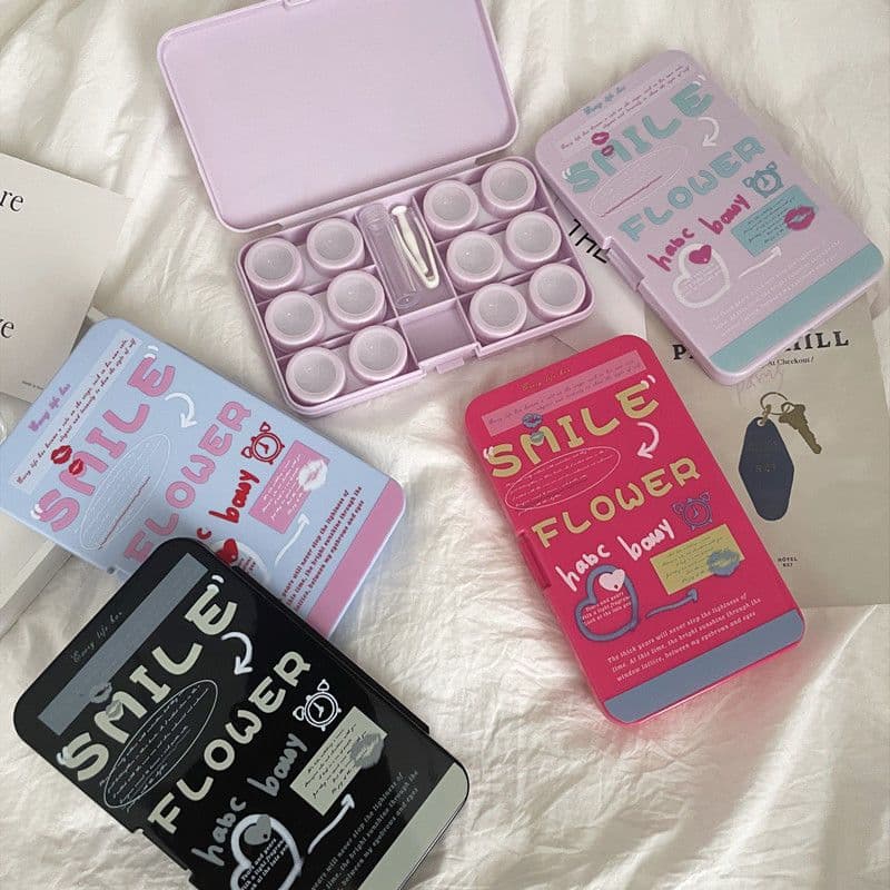 Multi-compartment contact lens case with storage tray